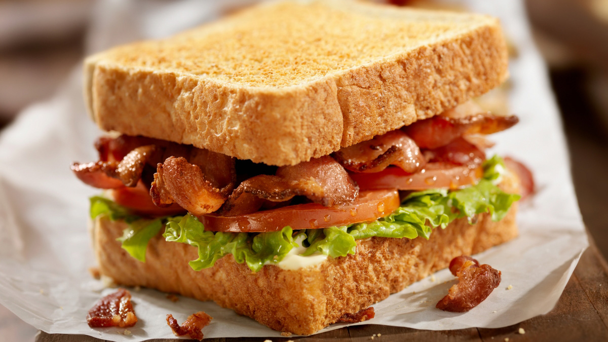 Fully cooked bacon used for BLT sandwich for foodservice operators